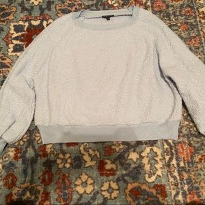 Light blue pullover, can be worn off the shoulder